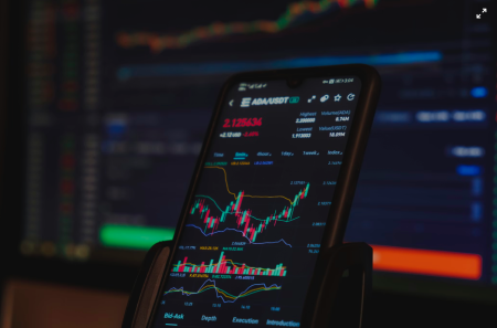 How crypto is reshaping digital play A phone showing the growth chart of a particular cryptocurrency. Courtesy of Pexels}